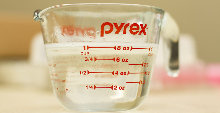Melt your soap base in a liquid measuring cup.