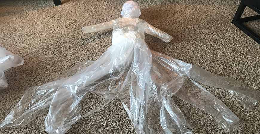 Use a plastic tarp to make a skirt for your packing tape ghost