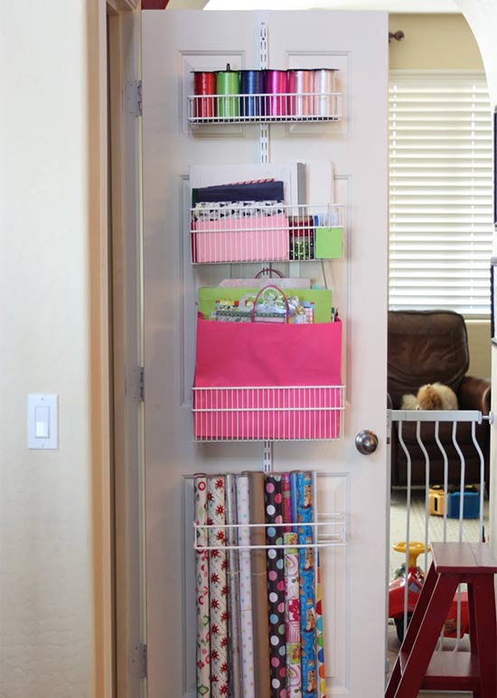 Use racks on your door to store gift wrap and bags!
